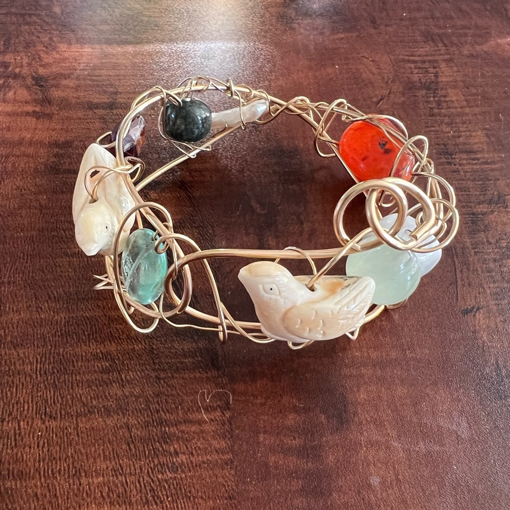 Gold wire cuff with stones